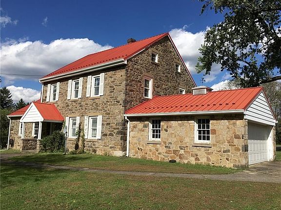 Stone all around with thick walls from the basement to the attic!