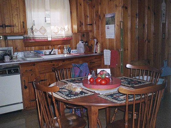 Eat-in knotty pine kitchen