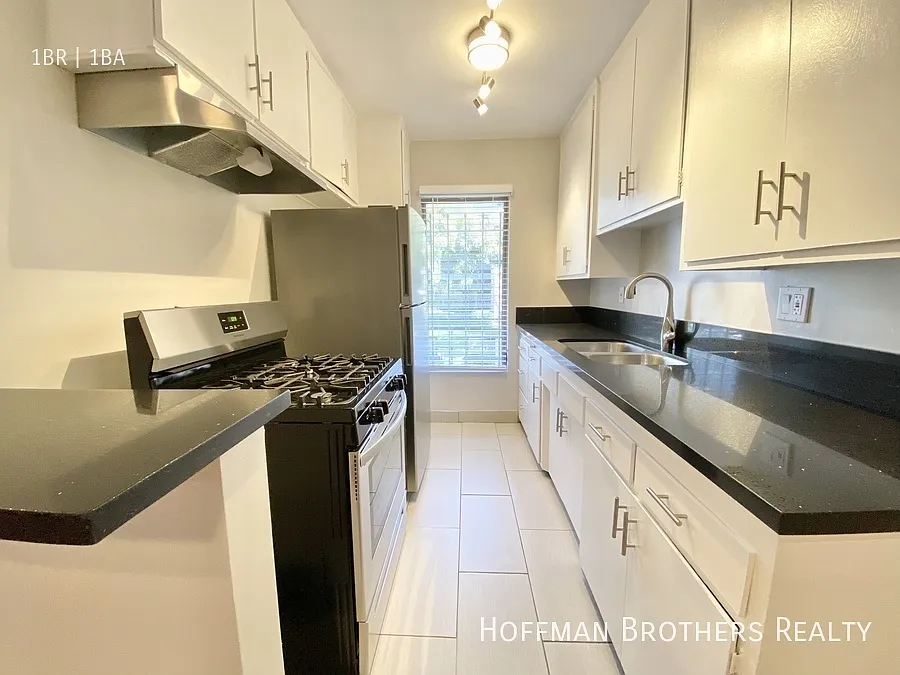 Building Photo - 1155 N Curson Ave #2