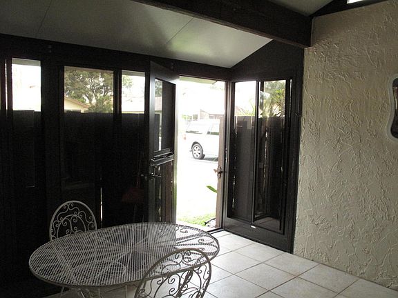 Newly enclosed patio with new windows an