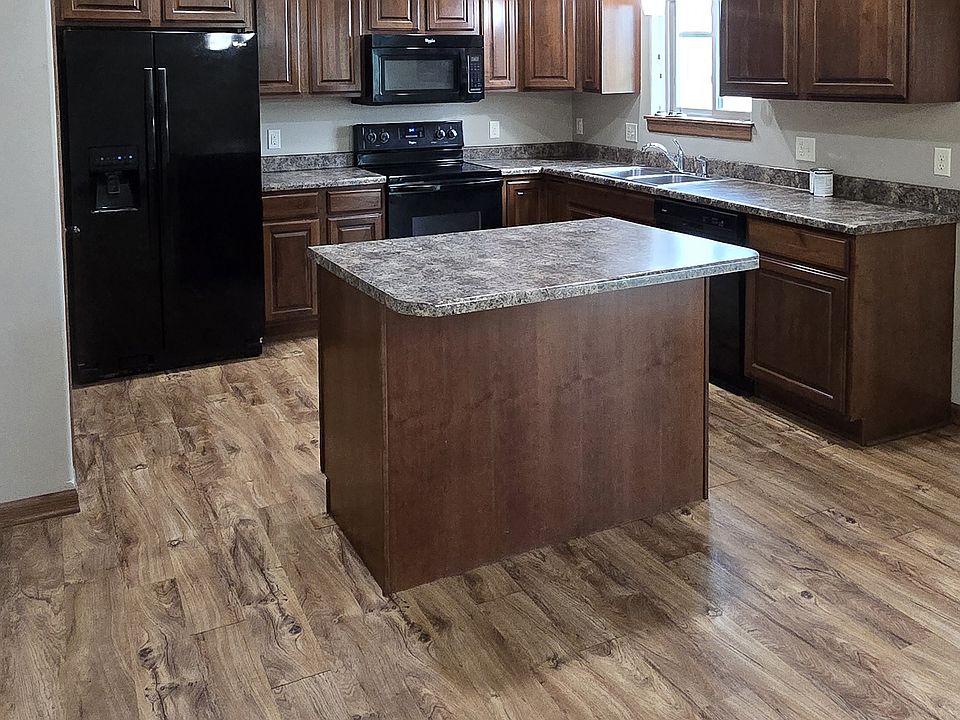Custom Cherry Cabinets and Island in Kitchen.