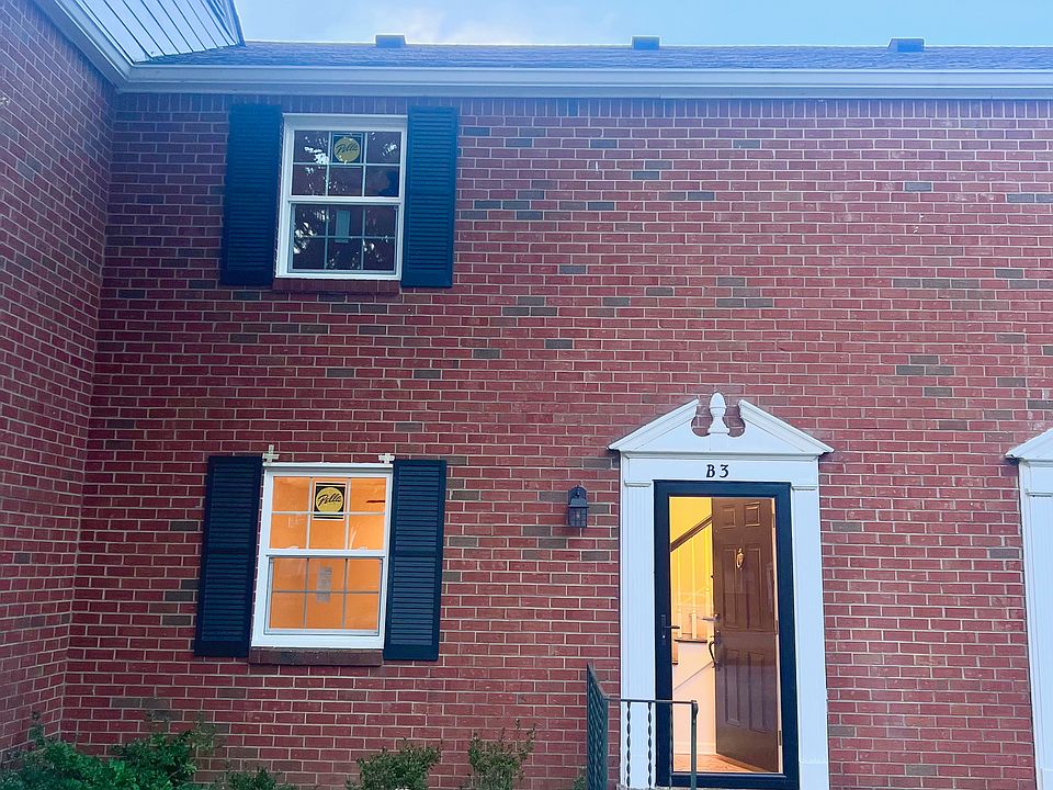 Front Entrance with New Pella Windows and landscape bed where you can plant your flowers