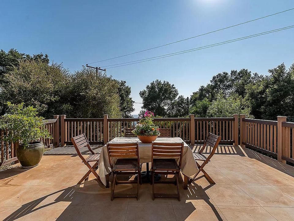 Enormous Patio right off main room. You can see out to the airport and ocean when its clear