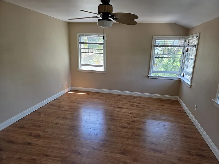 Living Room with ceiling fan.