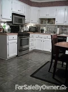 Kitchen View
						:
						Totally remodeled / all appliances remain