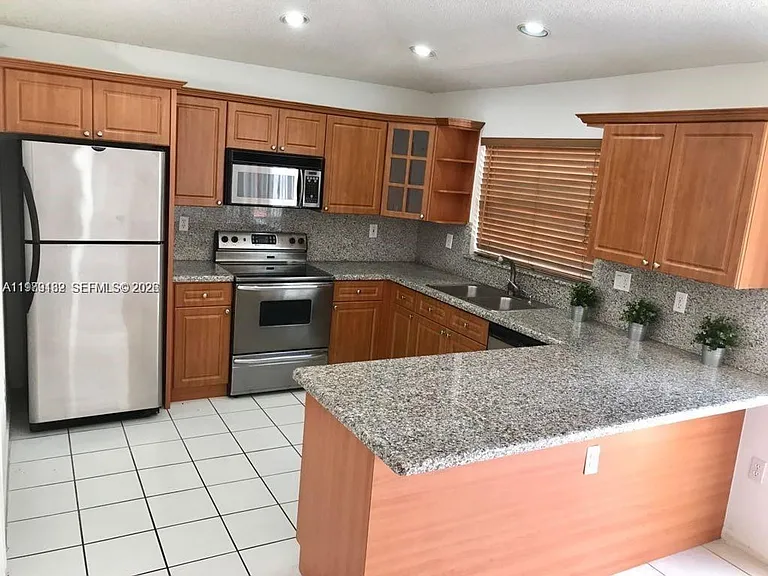 5758 NW 97th Pl #0 — Photo 2