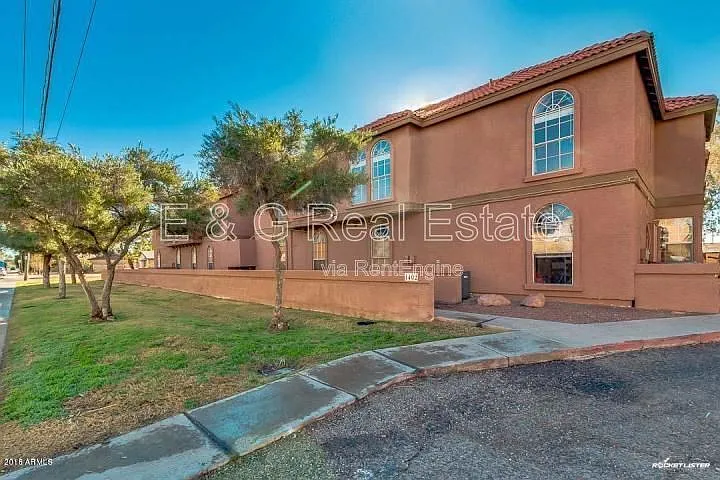 Building Photo - 1402 S Jentilly Ln #205