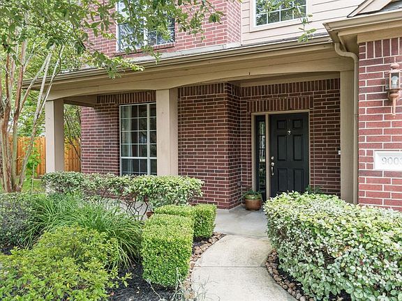Inviting entry with covered porch.