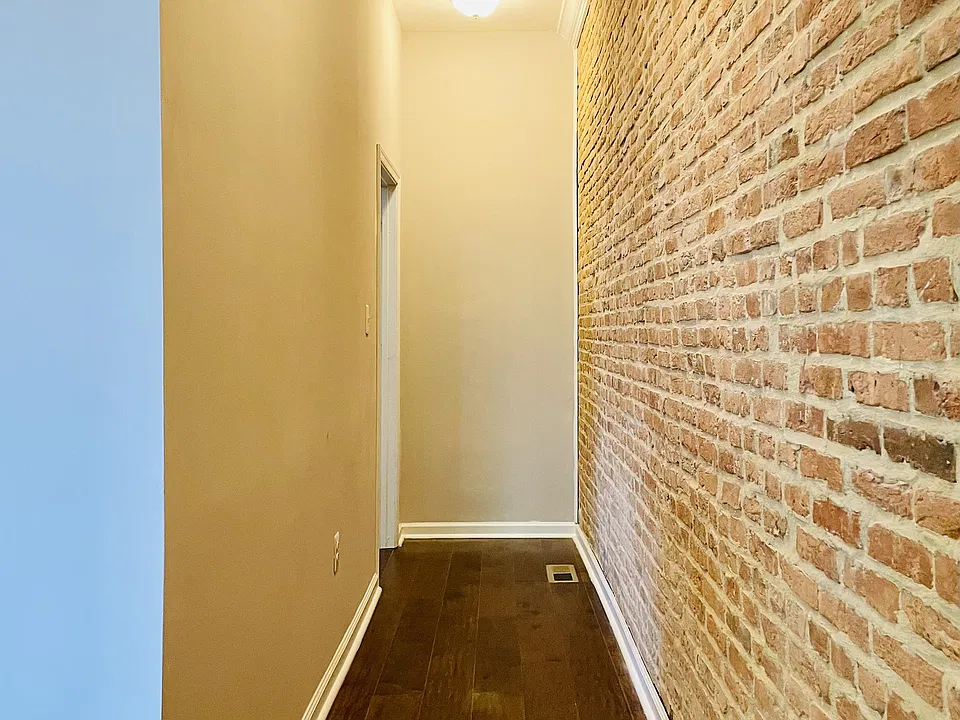exposed brick throughout hallways