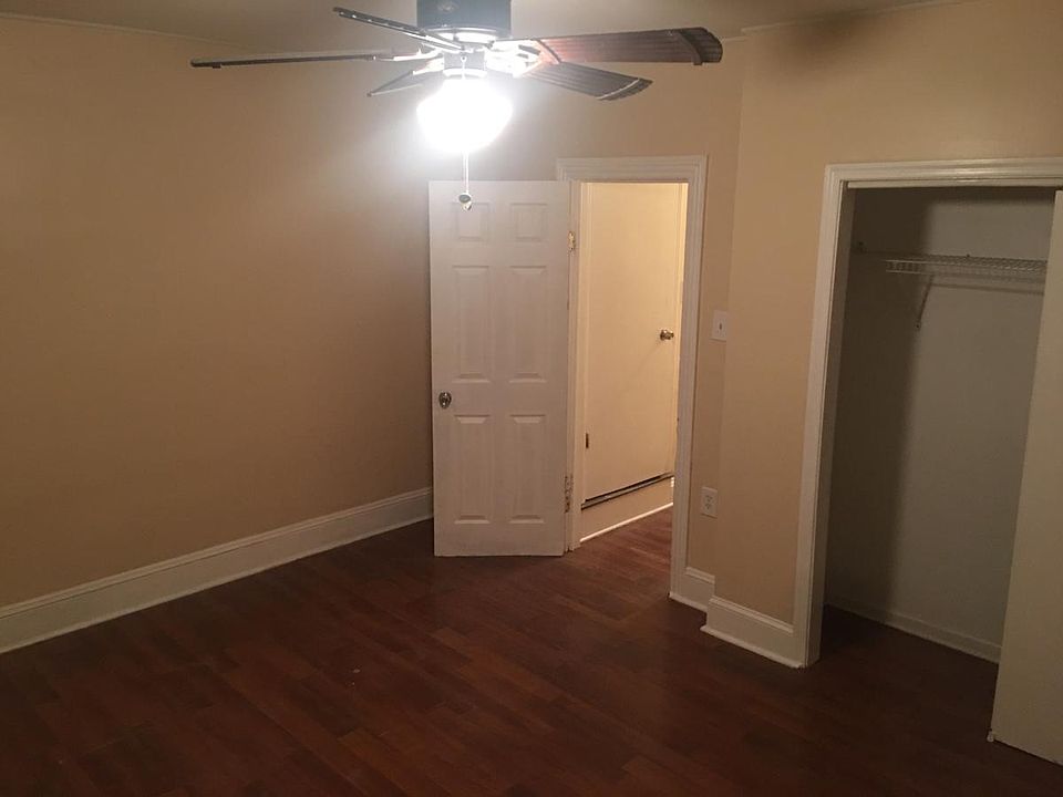 Large primary bedroom with closet space and clean finishes.