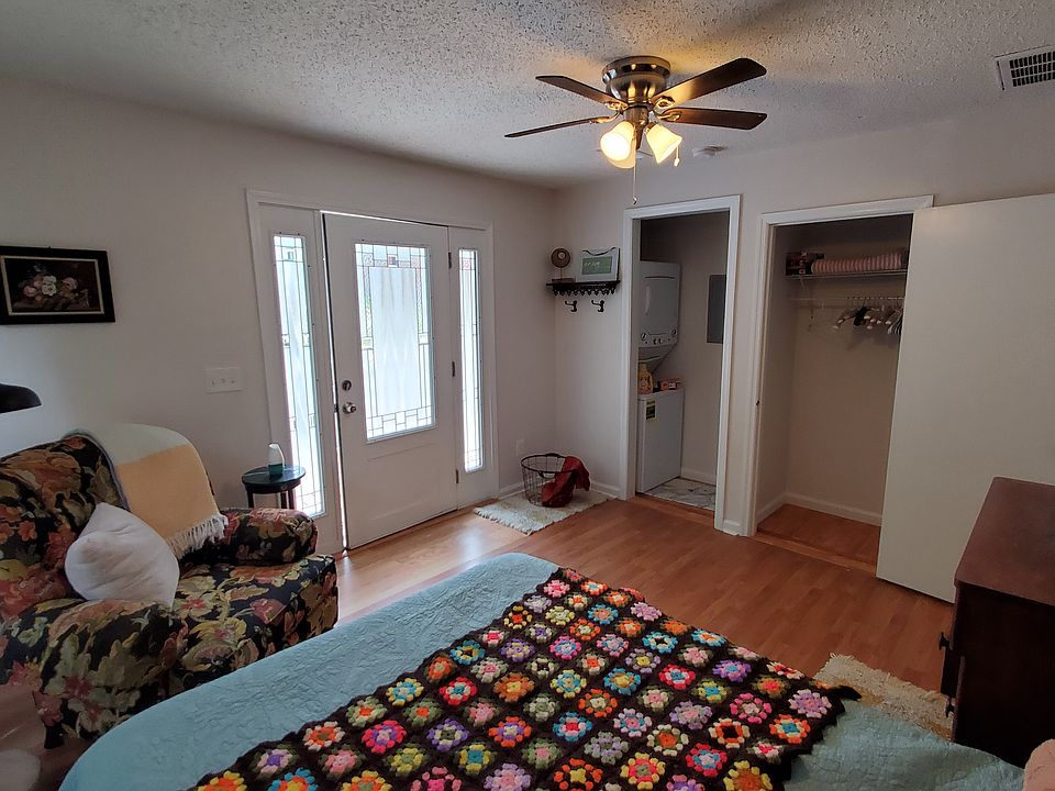 View of the stackable washer /dryer closet and clothes closet