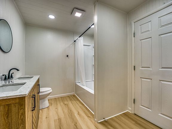 Master bathroom looking at walk in closet door