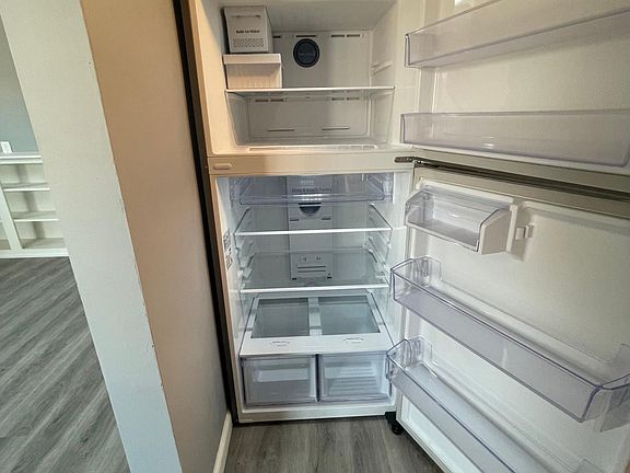 Brand new Samsung refrigerator with ice maker