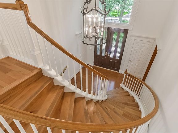 The front door as seen from the sweeping staircase.