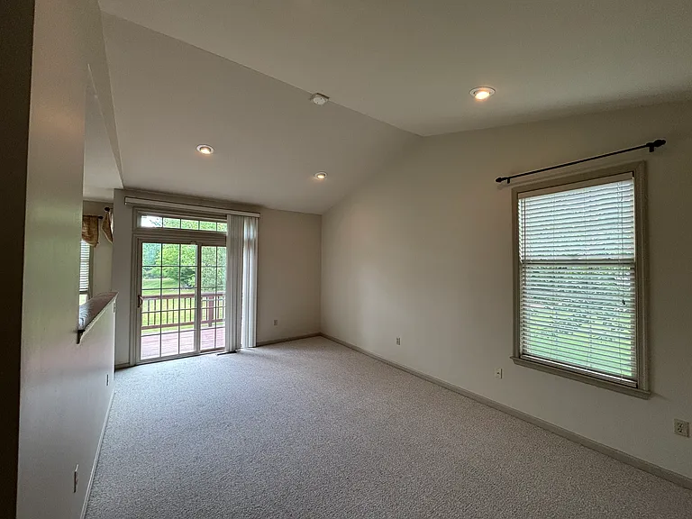 Main Level Living Area off Kitchen with access to Back Porch