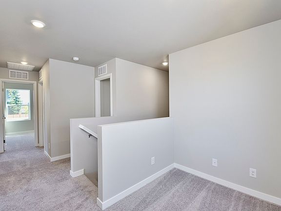 An upstairs game room is the perfect family entertaining space.