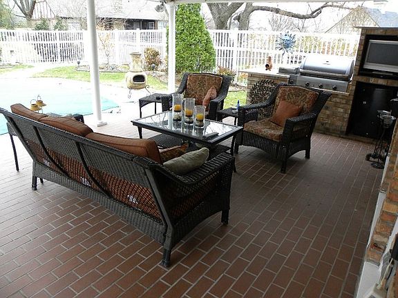 Covered patio with outdoor cooking area