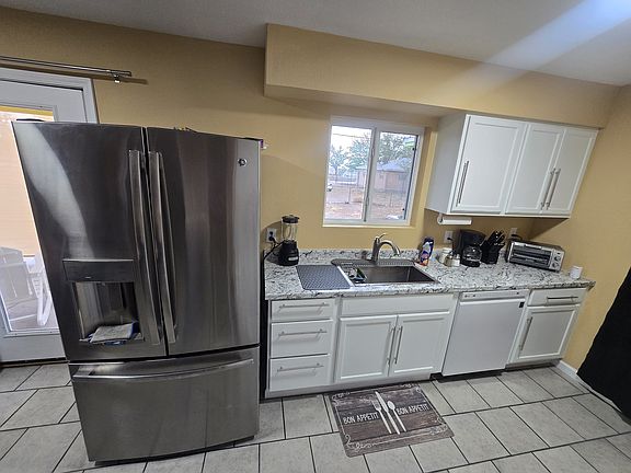 Kitchen with deep sink.