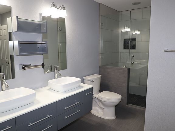 Updated bathroom with double sinks and shower