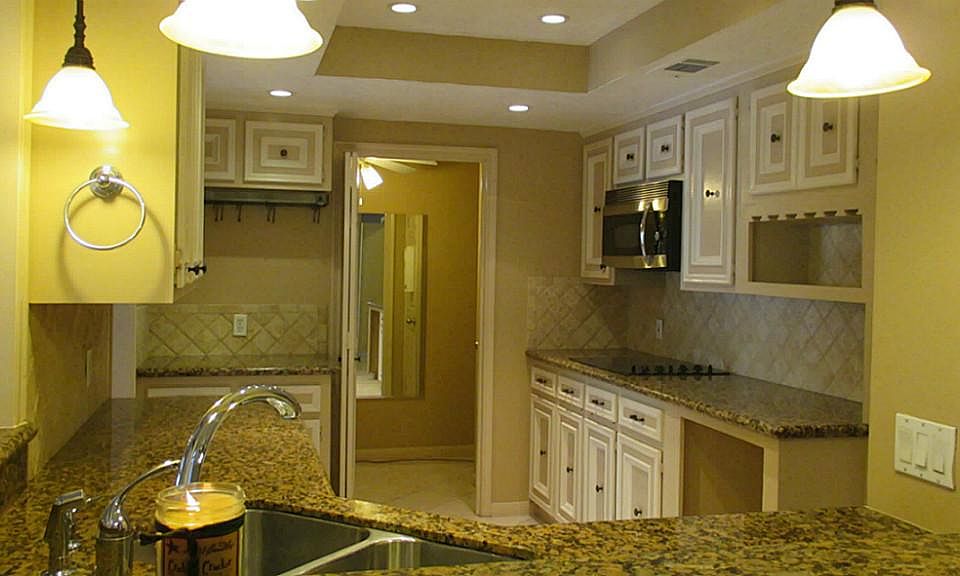 Look at this gorgeous kitchen. Microwave /oven combo and area for wine chiller.