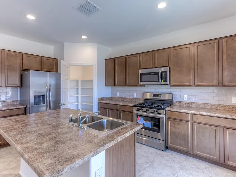 Kitchen with SS Appliances