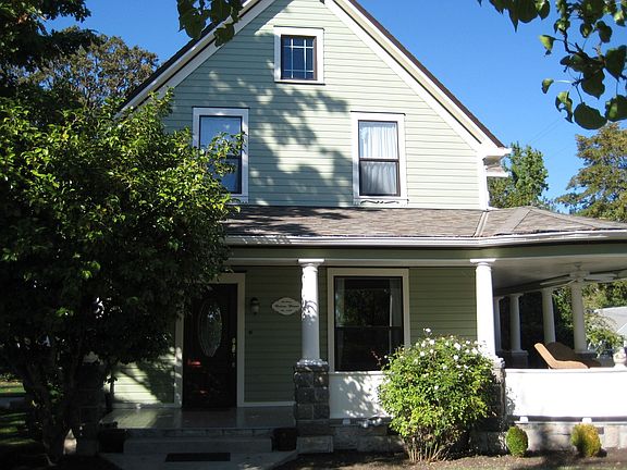 Front of house from sidewalk.