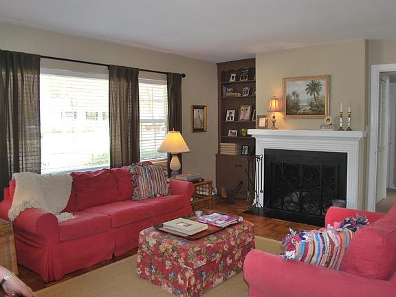 Formal living room with wood burning fir
