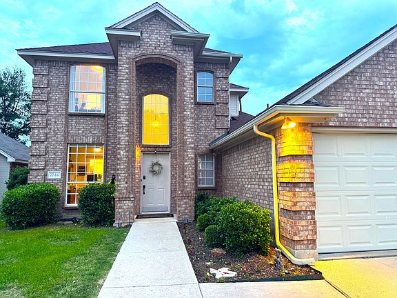 Features 2 car garage, Outdoor Lighting and Security cameras