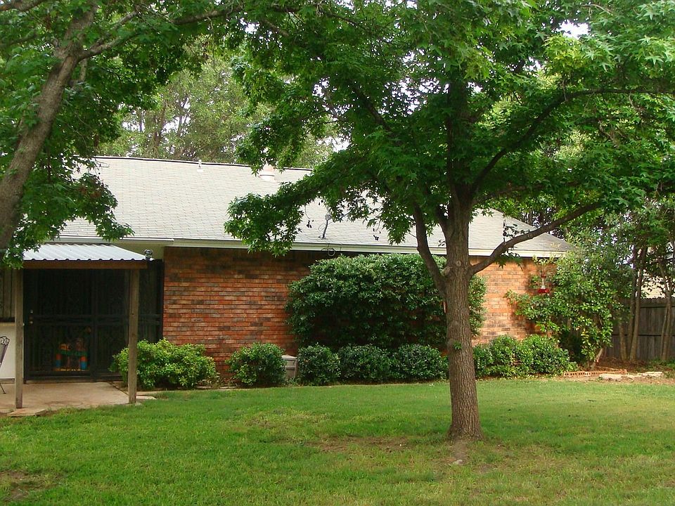 Back with a large yard.