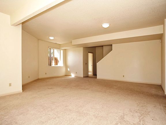 Lower Level Family & Game Room with 9'+ Ceilings