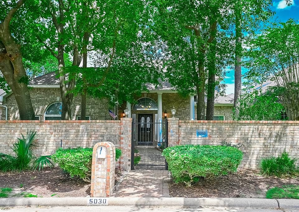 If you're looking for a home that stands out from the rest, you've found it! Begin your journey through the home with a beautiful entrance surrounded by an impressive landscape.