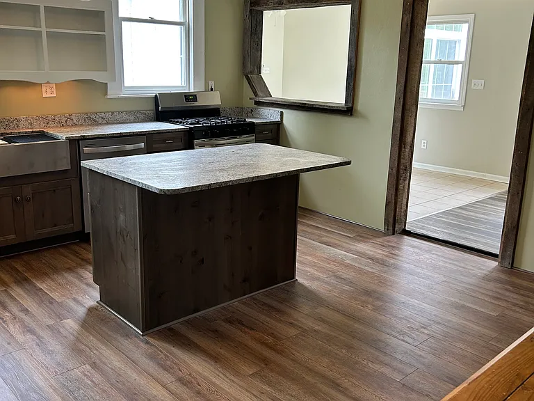 Kitchen with entry into expansive sun room