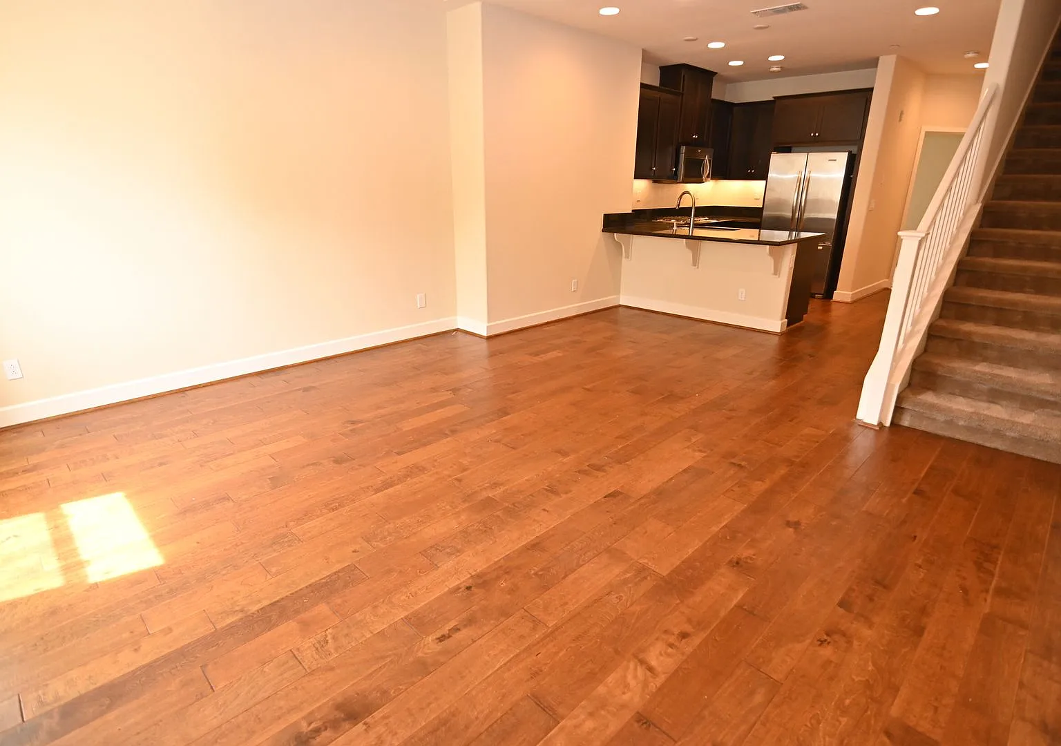 Tralee Village-Tri-Level Townhome, Modern Finished, Community Amenties (580 & Hopyard) — Photo 4