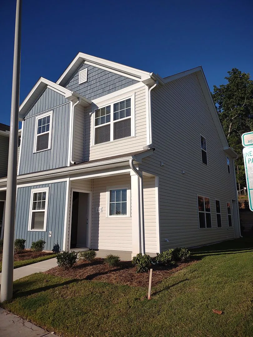 Townhome Located in Sanford- Minutes from Shopping, Dining, and Community Parks! Wont last long- ... — Photo 1
