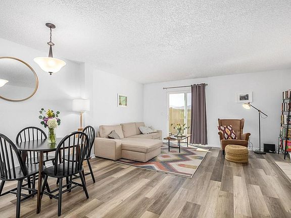 Dining and Living Room with Luxury Vinyl Plank Flooring