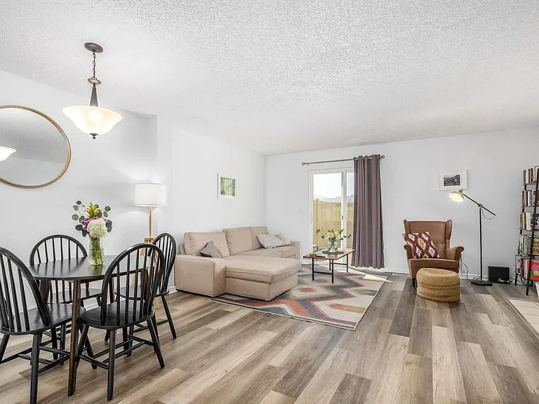 Dining and Living Room with Luxury Vinyl Plank Flooring