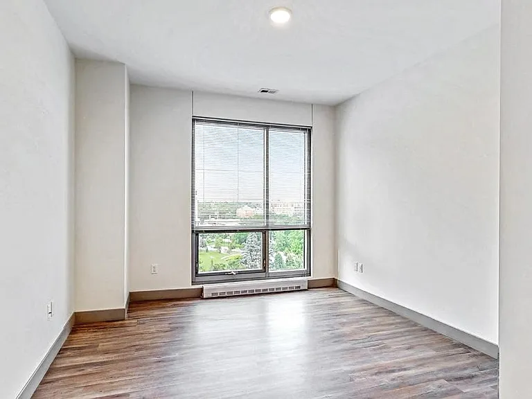 Our spacious bedrooms are filled with natural light.