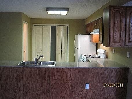 Huge kitchen with oak cabinets and granite