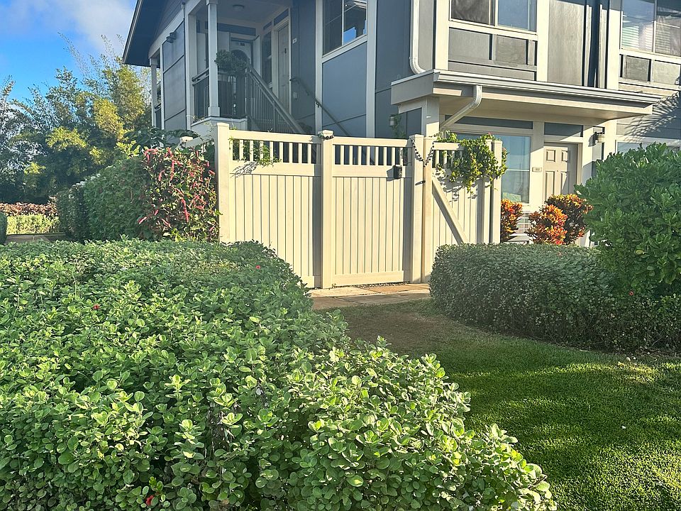 Private gated entrance leading to stairs.