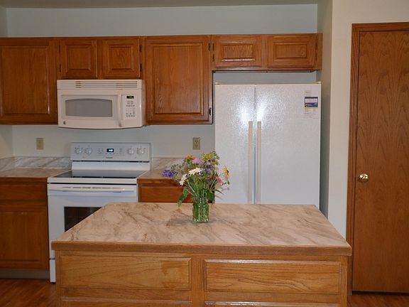 Spacious Kitchen, all appliances included-new refrigerator, stove/oven, microwave oven, dishwasher, garbage disposal, clothes washer and dryer