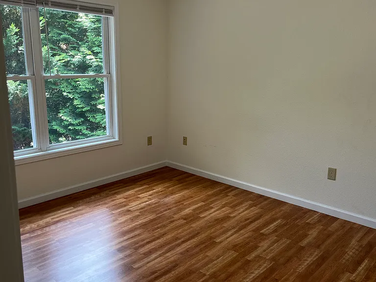 Bedroom to right has view of mountains