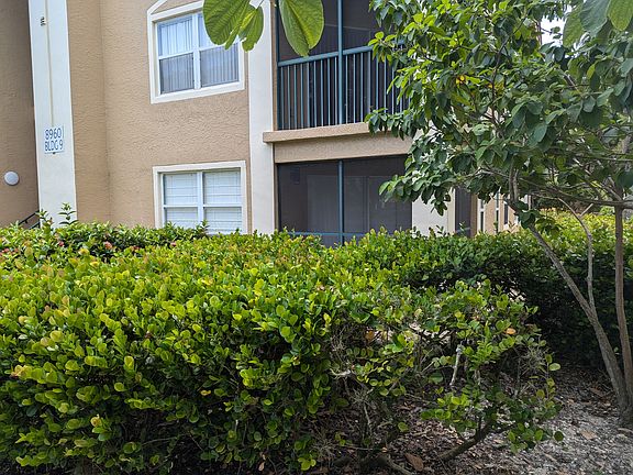 Outside view of the unit, screened lenai.