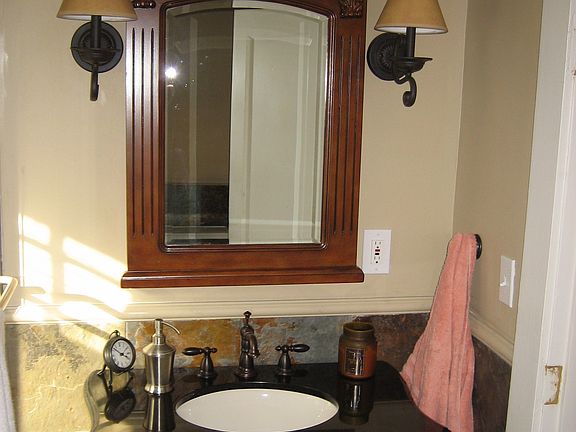 Updated bathroom w/ HE stacking w/d unit by LG.