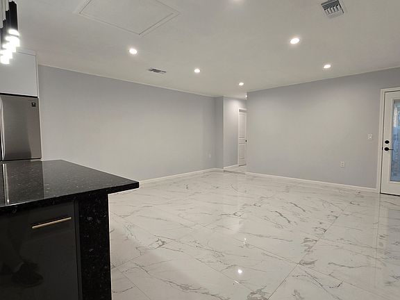 Living Room and Rear Side Entrance