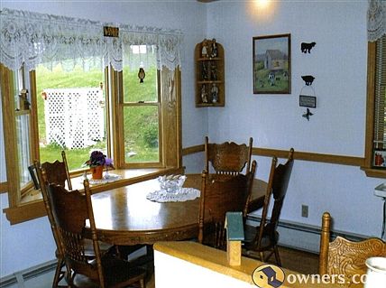 Dining area with beautiful oak bay window