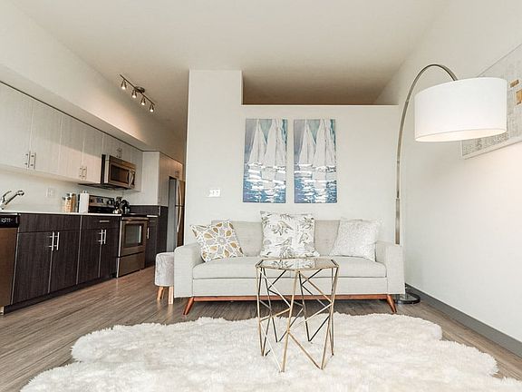 Seattle Apartments - Icon Apartments - Living Room and Kitchen