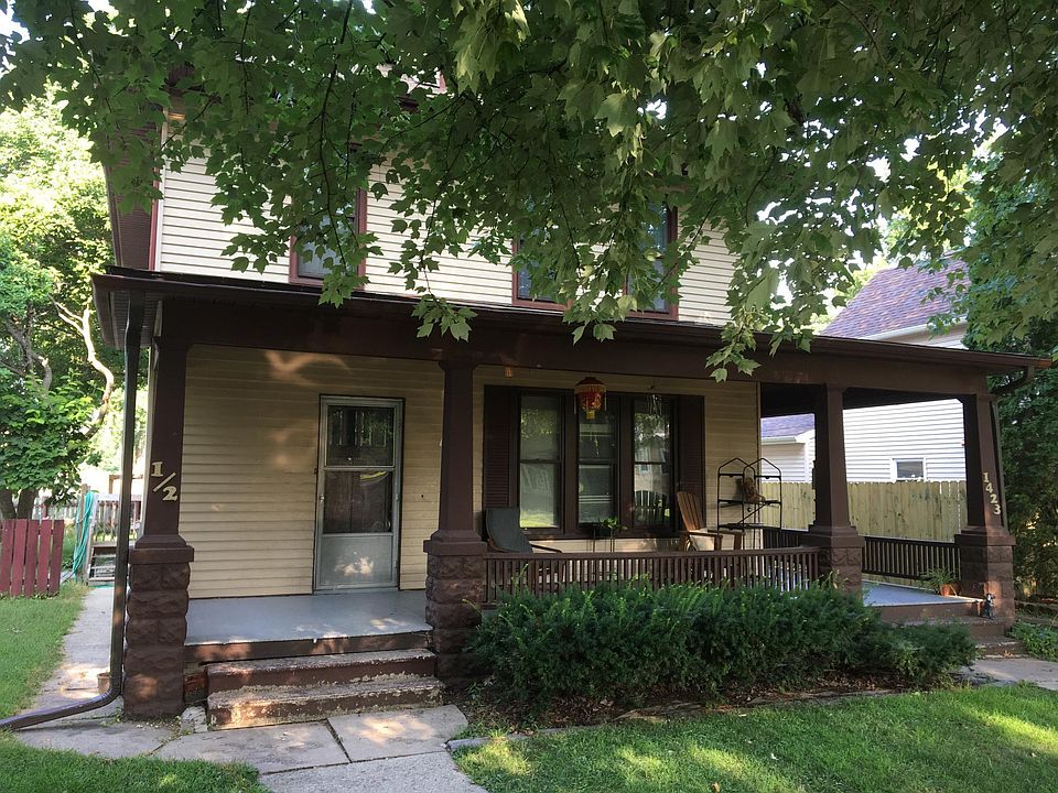 Large, shaded, east-facing front porch, quiet tree-lined street