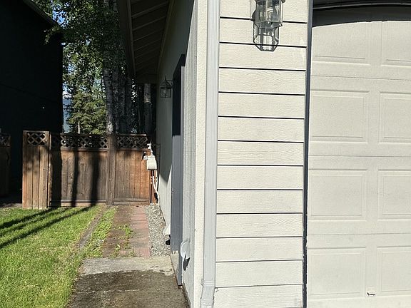 Walkway to gate to the back yard