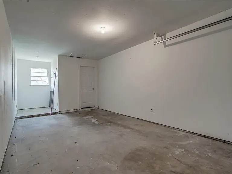 Oversize 1 car garage with utility area on the end