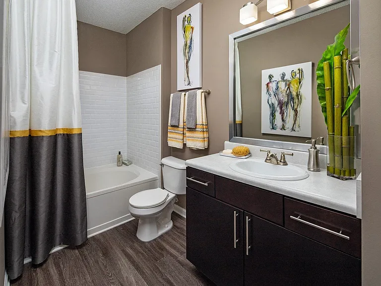 Garden soaking tubs and plentiful storage in bathrooms.